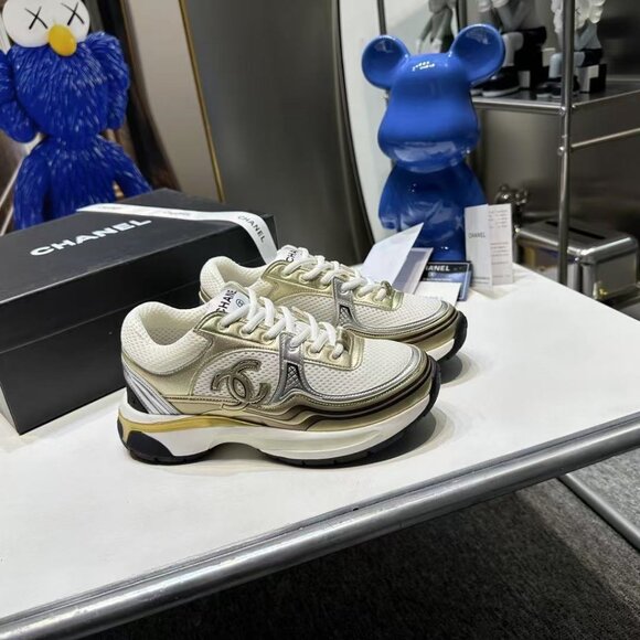 Chanel Women's Cream and Gold Sneakers - Picture 1 of 8